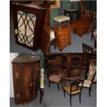 An assortment of 19th and 20th century furniture comprising: two mahogany hanging corner cupboards,