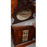 ^ An Edwardian part glazed mahogany cabinet (a.f.); together with a mahogany over mantel mirror