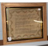 A 19h century framed needwork sampler bearing a verse