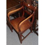 A George III mahogany plank-seated open armchair