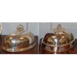 ^ Two silver plated meat domes