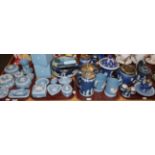 A large collection of Wedgwood Blue Jasper wares including: candlesticks, jugs,