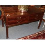 A reproduction mahogany Oriental style four drawer side table