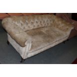 A mahogany framed Chesterfield style sofa on turned legs, 190cm wide