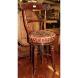 A William IV rosewood revolving piano seat
