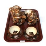 A Japanese Satsuma teaset, Meiji period (1868-1912) bearing mark for Meizan Hododa,