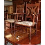 A pair of Arts & Crafts mahogany open armchairs
