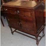 An oak four door cupboard (converted)