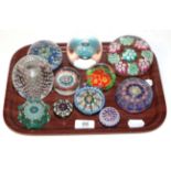 Eleven various paperweights including some 19th century millefiori examples