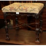 A 19th century Chippendale style mahogany stool, the pierced and turned frieze raised on turned