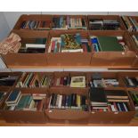 Twelve boxes of books including: novels; music reference; architecture;