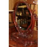 ^ A Victorian carved mahogany dressing table mirror, 83cm high