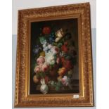 Manner of Monnoyer, A cornucopia of flowers in a vase on a stone ledge, oil on board, 57.