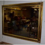 ^ A reproduction gilt framed over mantel mirror,