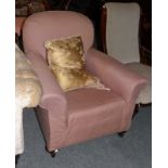 A Victorian mahogany framed armchair, later upholstered in salmon pink fabric