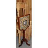A Victorian pole screen with embroidered bead work panel