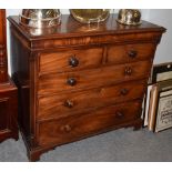 A George III mahogany chest of drawers,