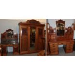 ^ An early 20th century carved and panelled mahogany three-piece bedroom suite, comprising a