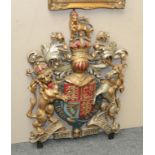 The Royal Coats of Arms of Great Britain in painted cast iron, 87cm high