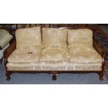 An early 20th century double caned three seater bergere sofa, 180cm wide