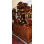^ A late Victorian mirror-back sideboard,