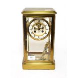 A brass four glass striking mantel clock, circa 1890, with twin tube mercury pendulum