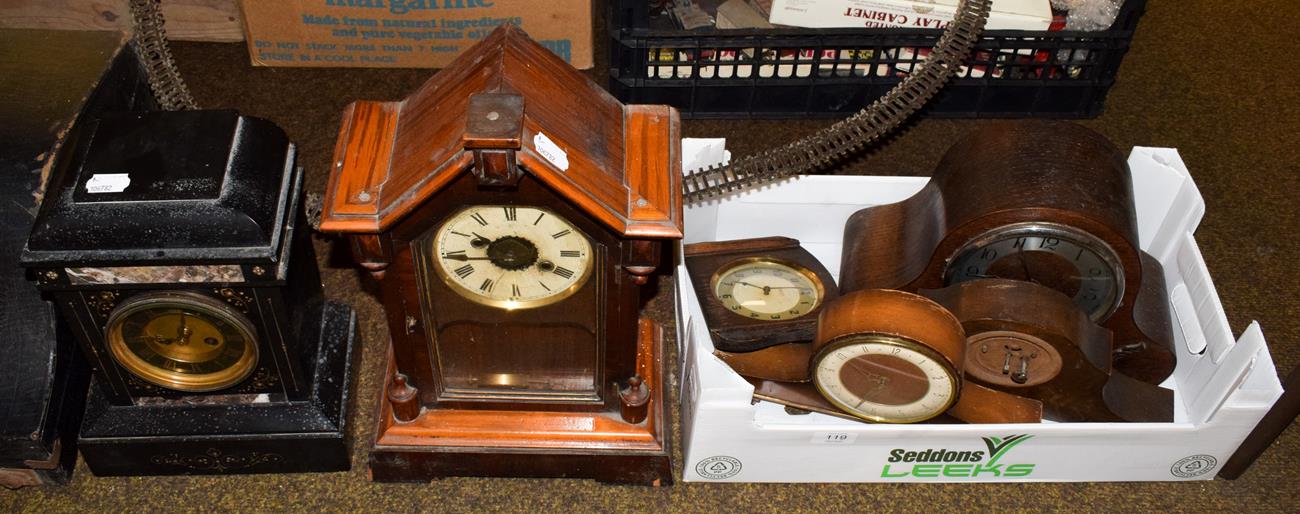 A Victorian black slate striking mantle clock, an alarm mantel clock, a striking mantle clock and