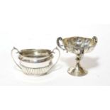 An Edward VII silver pedestal bowl, by Horace Woodward and Co. Ltd, Birmingham 1908, the lobed