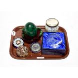 Four various paperweights, including two millefiore examples, a large Malachite egg, glass ash tray,