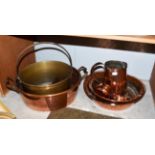 Various copper pans and jugs together with a brass jam pan