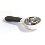 An Elizabeth II silver ladle with a wooden handle, by Jeffrey Sofaer, London, 2001, the silver