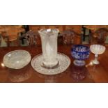 Five pieces of good quality cut glass including an impressive vase and a blue flash glass footed