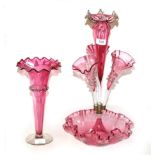 A Victorian cranberry glass Epergne, together with a cranberry glass flower vase, together with a