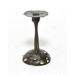 An Art Nouveau Orivit candlestick, model no.2284, the pierced domed base cast with stylised foliage,