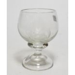 A 19th century etched glass pedestal cup, decorated with a triple masted ship amongst the waves