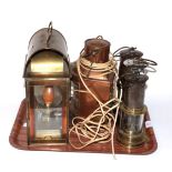 A Bedlington miners lamp, two Eccles miners lamps, a ships copper lamp and a brass lamp (5)