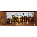 A quantity of late 19th century copper and brass, including dump weights, jam pans, candlesticks, an