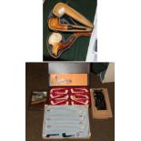 A group of smoking related items, including meerschaum pipes, clay pipes, mouth pieces, a players