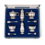 An Edward VII and George VI Silver Condiment-Set, by Hukin and Heath, Birmingham, 1936 and 1937,