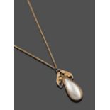 An Arts & Crafts Mother-of-Pearl Pendant on A 9 Carat Gold Chain, a yellow leaf motif surmounts a