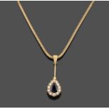 An 18 Carat Gold Sapphire and Diamond Pendant on Chain, the pear cut sapphire within a border of