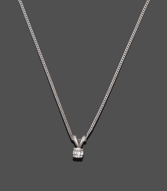 A Diamond Solitaire Pendant on An 18 Carat White Gold Chain, the round brilliant cut diamond in a