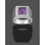 A Synthetic Sapphire and Diamond Ring, the scissor cut synthetic sapphire simulating alexandrite