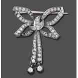 A Diamond Bow Brooch, set throughout with old cut and rose cut diamonds, the two bow tails
