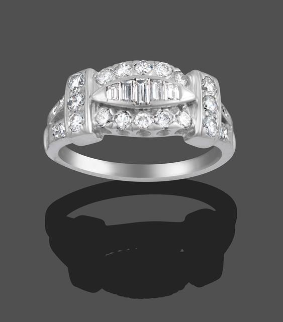 A Diamond Ring, two rows of round brilliant cut diamonds with a central panel of five graduated