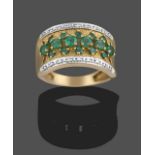 A 9 Carat Gold Emerald and Diamond Ring, a row of round cut emeralds within two rows of smaller