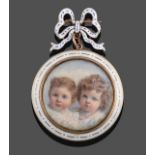 An Enamel Portrait Brooch, a bow motif enamelled in blue and white suspends a circular frame