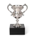 A Victorian Silver Cup, by Martin, Hall and Co., Sheffield, 1861, baluster and on spreading foot,