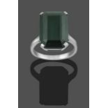 A 9 Carat White Gold Green Tourmaline Ring, the emerald-cut green tourmaline in a four claw setting,