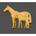 A 9 Carat Gold Mare and Foal Brooch, the yellow textured mare and foal in a standing pose,